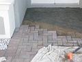 04Laying Pavers on Concrete Ramp